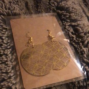Homemade wooden earrings in gold